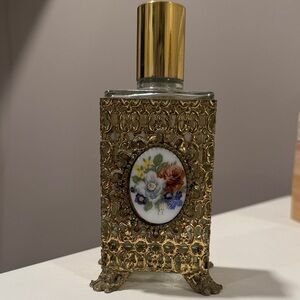 Vintage Perfume Bottle with Floral Design
